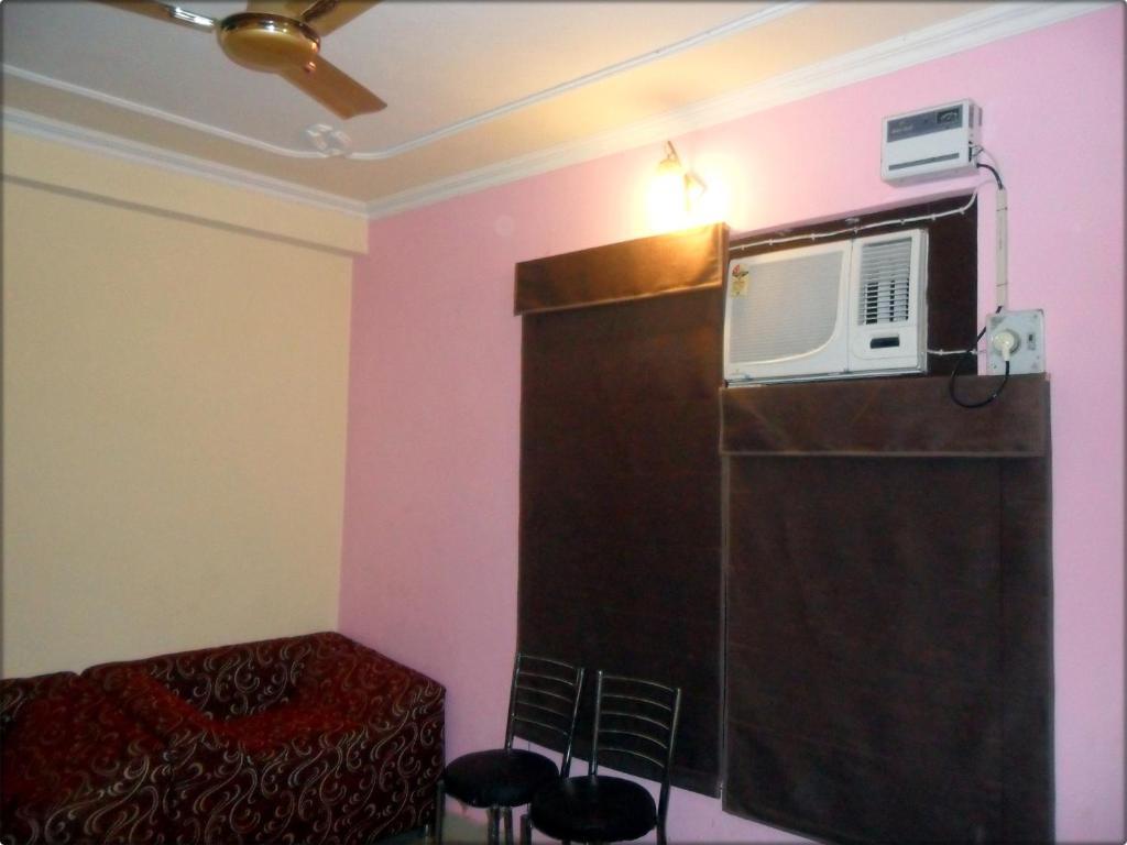 Suncity Inn Nueva Delhi Habitación foto