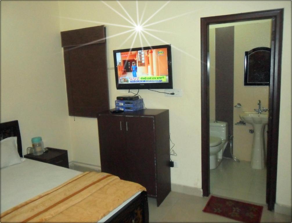 Suncity Inn Nueva Delhi Habitación foto