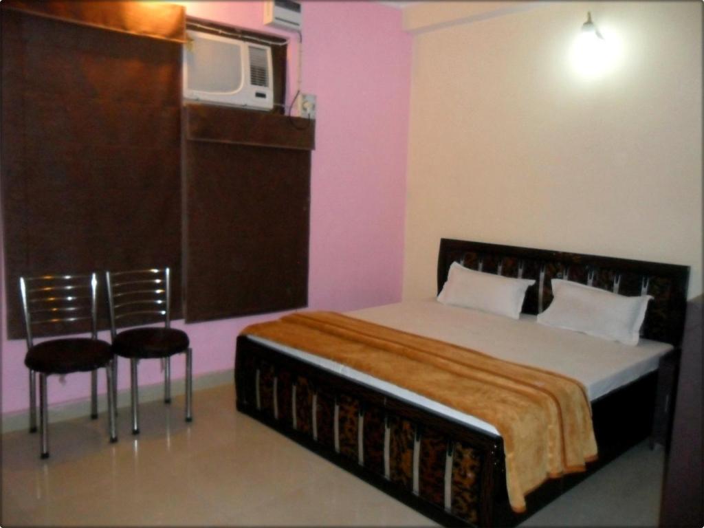 Suncity Inn Nueva Delhi Habitación foto
